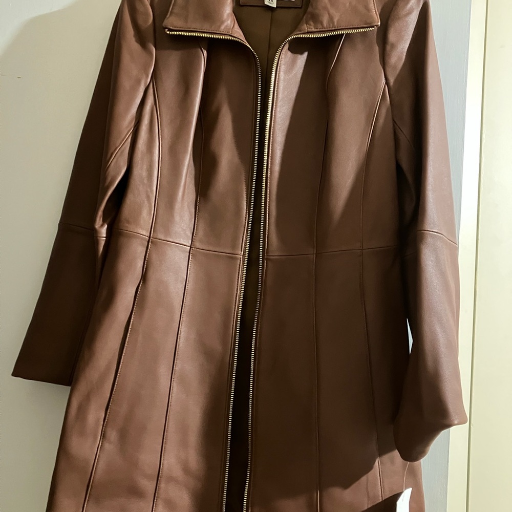 Genuine leather coat xs brand new  colors tan full lined polyester!. With tag